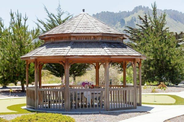 Large wooden gazebo in the The Cottages of Carmel courtyard