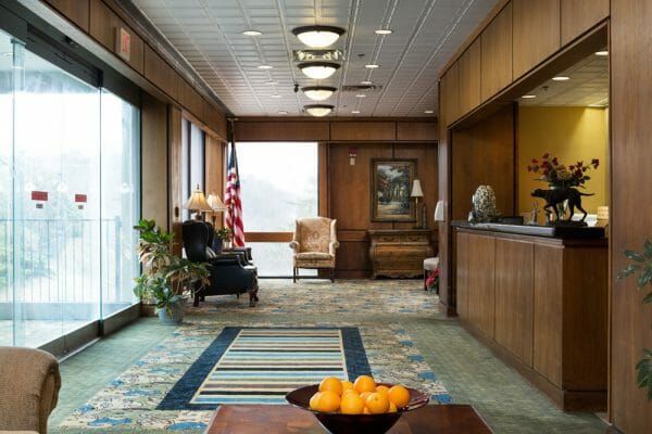Lobby and reception desk inside Elite Nursing & Rehab