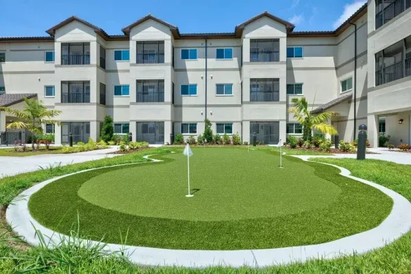 Discovery Village at Sarasota Bay exterior of the community and putting green