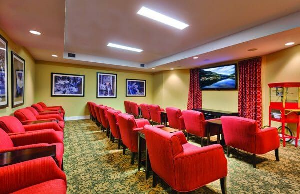 Movie theater style seating in the Lincoln Meadows screening room