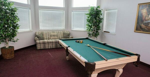 Vista del Rio billiards room with green felt pool table