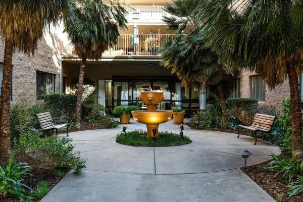 Courtyard with gold fountain at Pacific Pointe