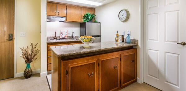 Apartment kitchen in a home at Oakmont Gardens