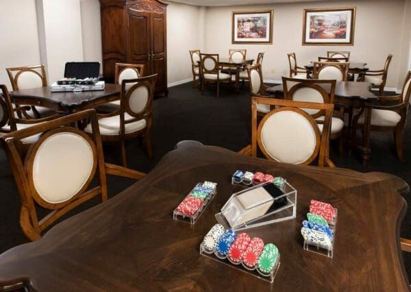 Card tables in the Freedom Plaza Care Center game room