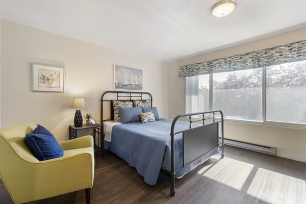 The bedroom in a model apartment at Brookdale Federal Way