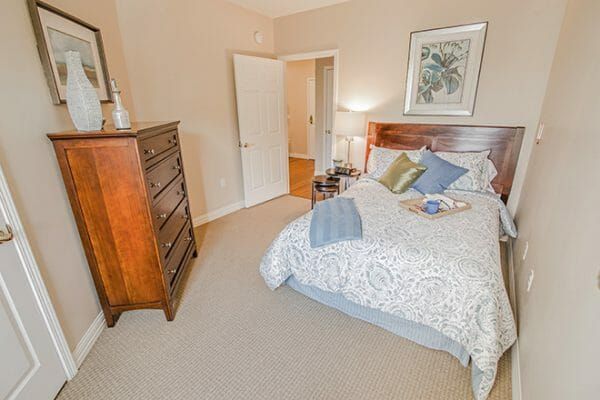The bedroom in a model apartment at Brookdale Lake Orienta