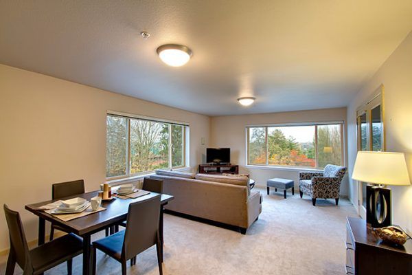 The living and dining areas in a model apartment at Brookdale West Seattle