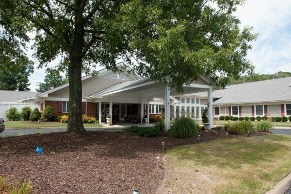 Commonwealth Senior Living at Churchland House front entrance with covered driveway