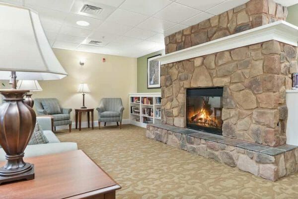 Large stone fireplace in the TerraBella Lake Norman lobby