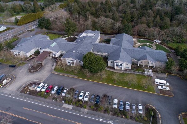 An aerial view of GenCare Lifestyle Federal Way's building, grounds and parking lot