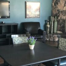 Dining table and stuffed chairs in Hy-Lond Health Care Center - Modesto
