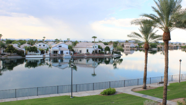 Waterfront view and palm trees at The Forum at Desert Harbor