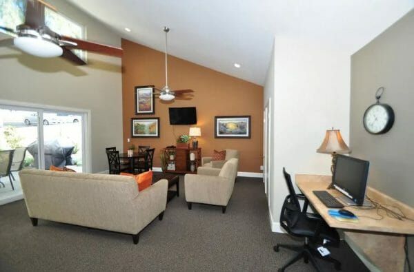 Living area in model apartment at Peppertree Senior Apartments