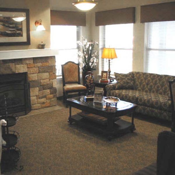 A fireside lounge off of the lobby at Maple Ridge by Bonaventure
