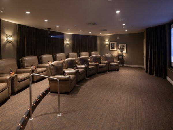 Stadium style seating in leather chairs in the Oakmont of Folsom movie theater