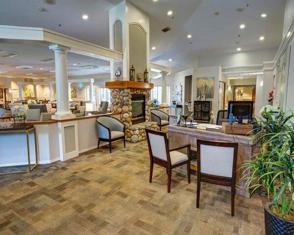 Paramount Court Senior Living lobby and common area around a fireplace