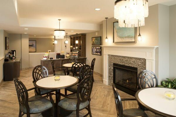 Community lounge with fireplace at Oakmont of Pacific Beach