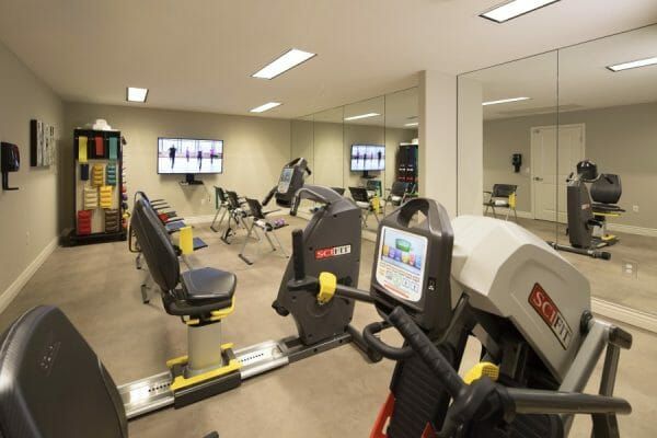 Fitness studio with equipment at Oakmont of Pacific Beach