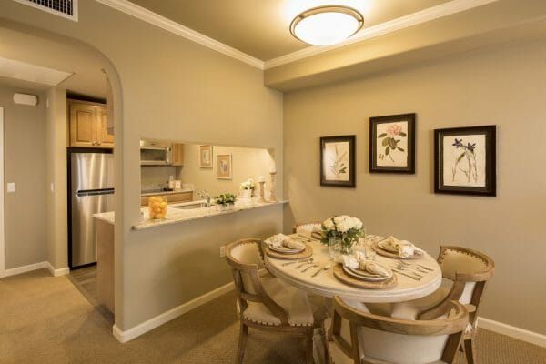 Model home kitchenette and dining area at Oakmont of Pacific Beach