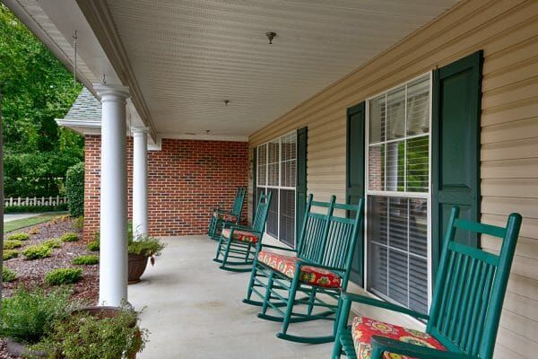 Rocking chairs on the front porch of Country Cottage - Russellville
