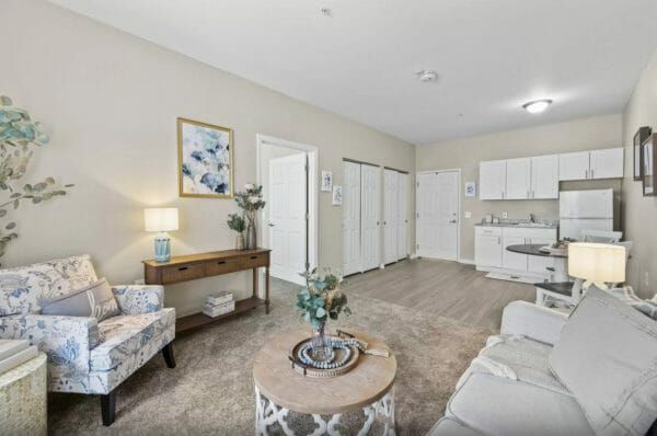 The living, dining and kitchenette areas of a model apartment at Seaton Voorhees