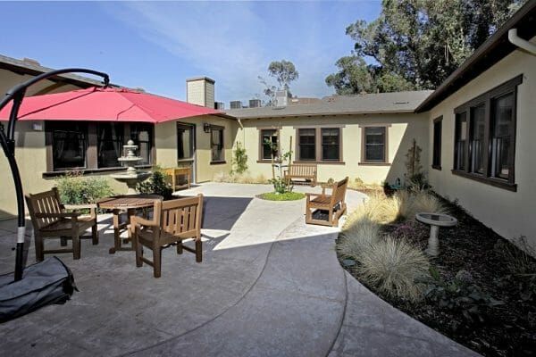 Outdoor courtyard and resident seating at Sunol Creek Memory Care