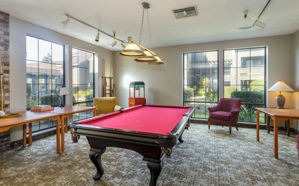 A billiards table in the activity room at The Atrium at Carmichael