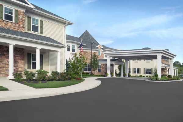 The Bristal Assisted Living at Sayville driveway and covered entrance