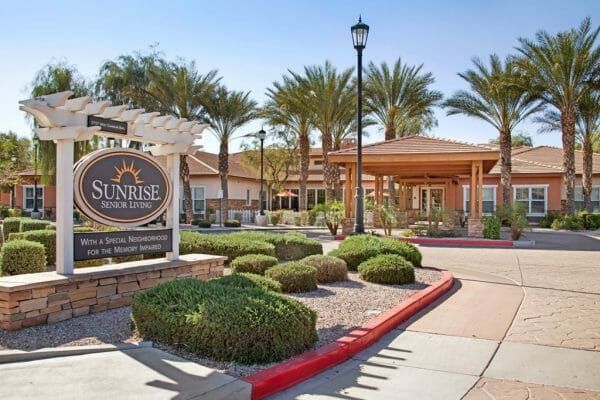 Entrance sign and building front of Sunrise of Chandler