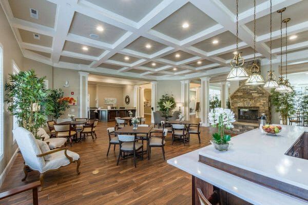 Blue Ridge Assisted Living common area near the lobby, with coffered ceilings and multiple tables and seats
