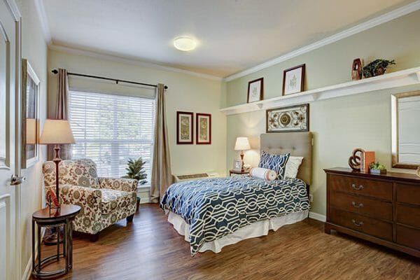Model bedroom in an apartment home in Brookdale Broadmoor