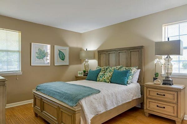 Model bedroom in an apartment home at Brookdale Cedar Springs