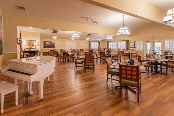 Brookdale Desert Ridge dining room with a white grand piano