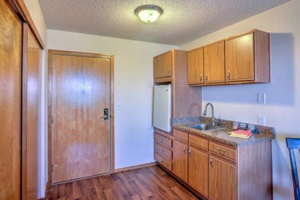 Kitchen area in a Brookdale El Camino model apartment