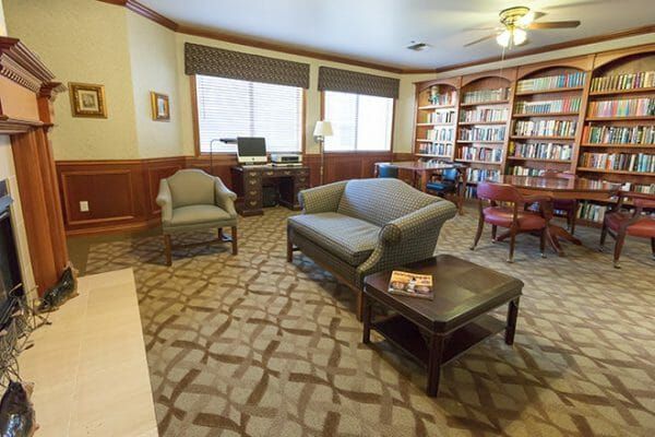 Resident library with built in bookshelves in Brookdale Lodi