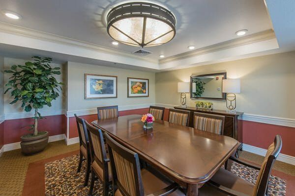 Brookdale Skyline private dining room with an 8 top wooden table