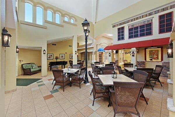 Community dining room with an outdoorsy look at Brookdale Tempe