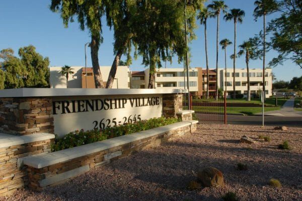 Entrance sign and building of Friendship Village Tempe