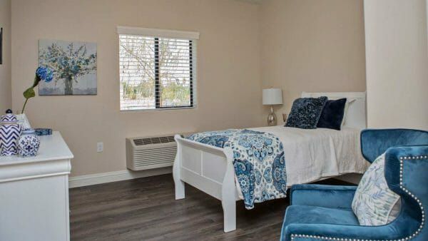 Model bedroom at Bee Hive Homes of St. Johns