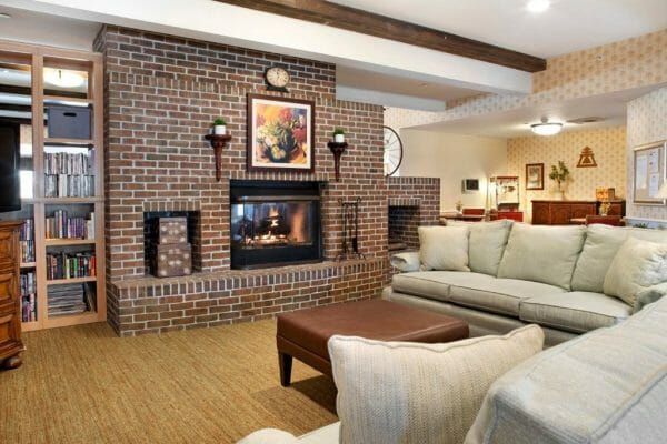 Community Living Room with Fireplace at Sunrise at Canyon Crest