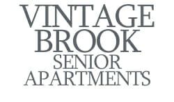 Vintage Brook senior apartments logo