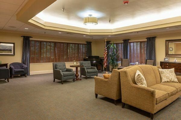 Multiple seating areas in the Brookdale Meridian Lakewood community living room