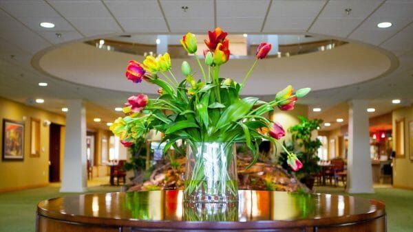 Colorful flowers in the lobby of Provident Crossings Retirement