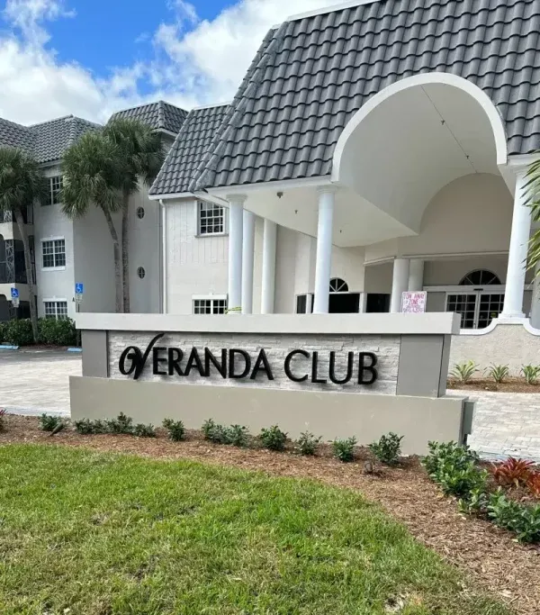 Veranda Club entry with the sign