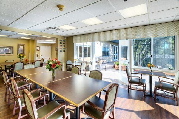 Community dining room in WindChime of Marin Memory Care