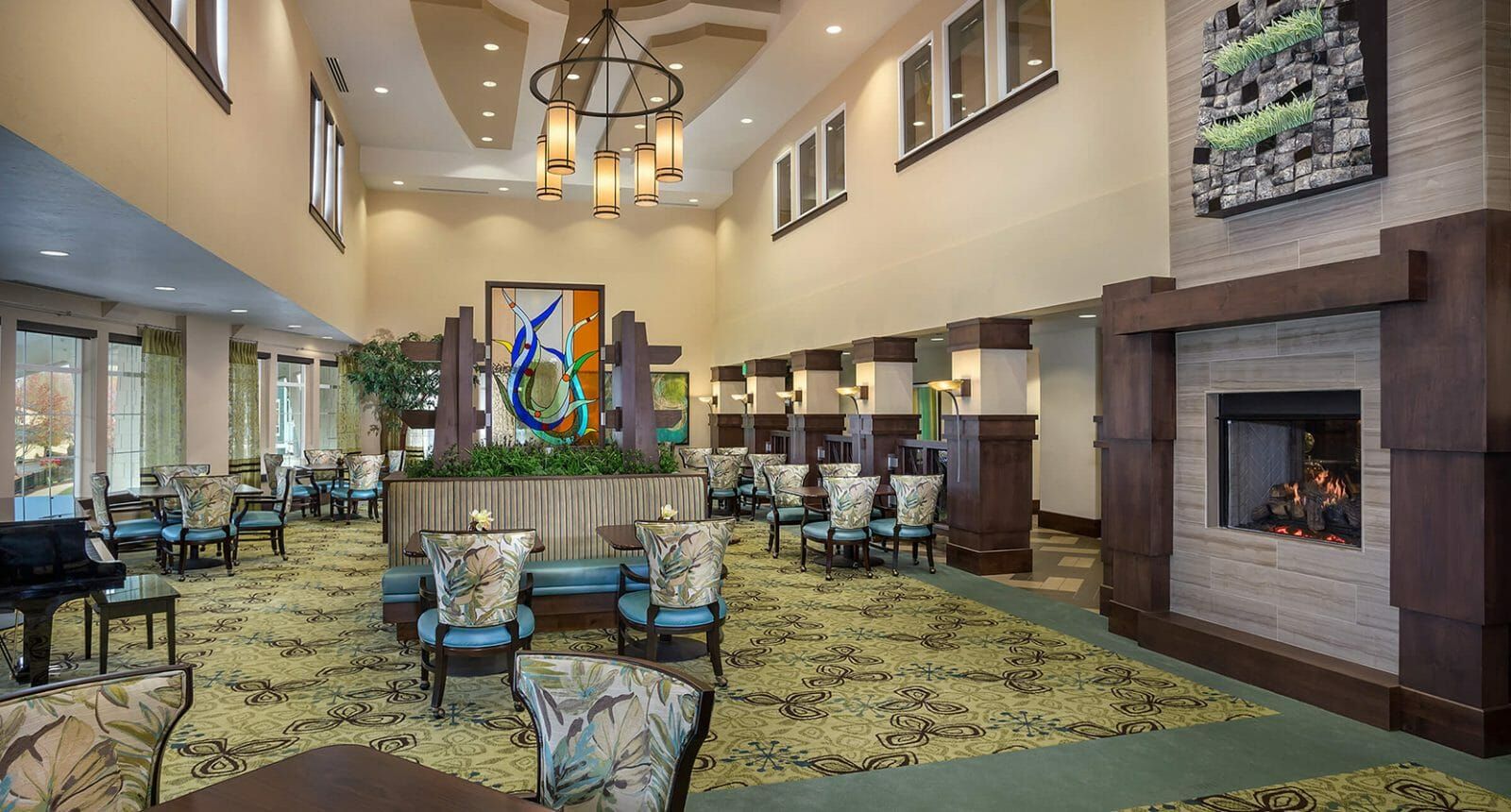 Senior housing community interior with vaulted ceilings and seating for guests and residents