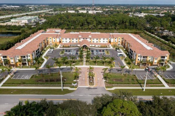 An aerial view of Palomino Gardens Retirement's building and parking lot