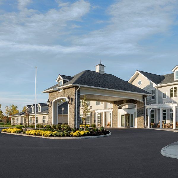 Brooklyn Pointe Assisted Living & Memory Care's building front, driveway and covered entrance