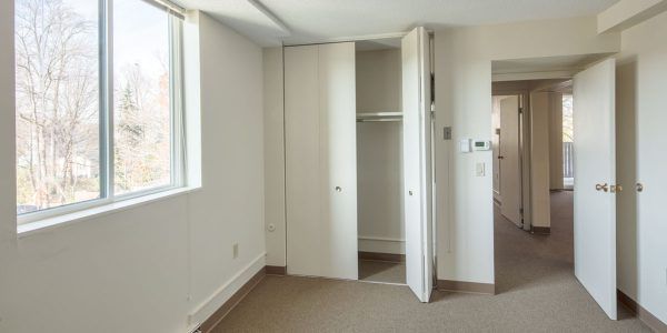 The bedroom and closet of a vacant apartment at Valley Vista Apartments