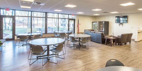 Multiple gathering areas in Valley Vista Apartments' community room